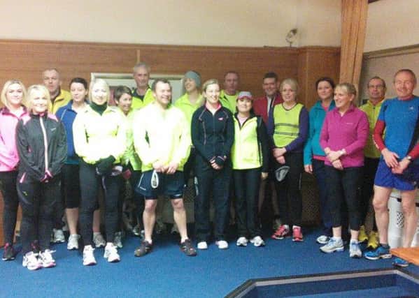 Athletes at Fit N Running's Monday evening beginners' class at the Michelin Club.