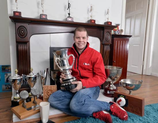 Jamie Hamilton with some of his trophy haul from a road racing season that saw him voted as Ireland's Most Promising Road Racer 2013.
PICTURE BY STEPHEN DAVISON