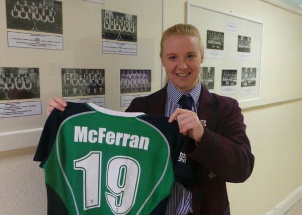 Larne Grammar pupil Ayeisha McFerran proudly shows off her Ireland shirt. INLT 04-904-CON
