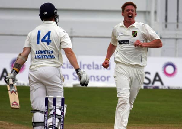 Ireland's Craig Young celebrates taking a wicket for the North West Warriors against Leinster Lightning last year.