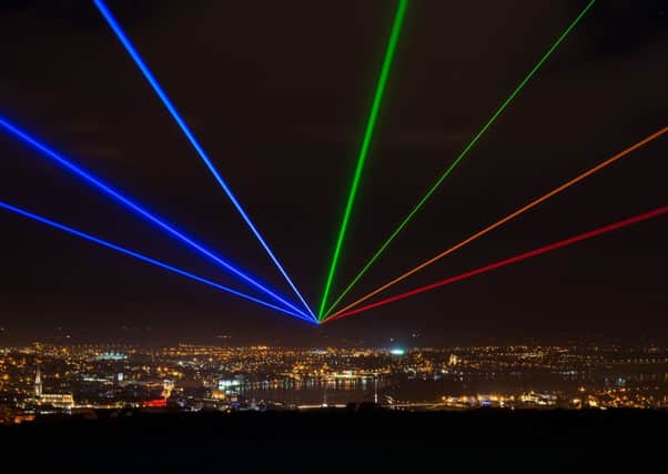 Picture Issued on Behalf of Derry City Council No Fee for reproduction    Yvette Matternâ¬"s Global Rainbow illuminates the night sky over Derry~Londonderry as the former City of Culture began a series of Legacy events organised by Derry City Council during 2014. The beams of light by the internationally renowned American and Berlin based artist can be seen across the city until Tuesday the 21st of January in a symbol of new hope for the city . Picture Martin McKeown. Inpresspics.com. 16.1.14