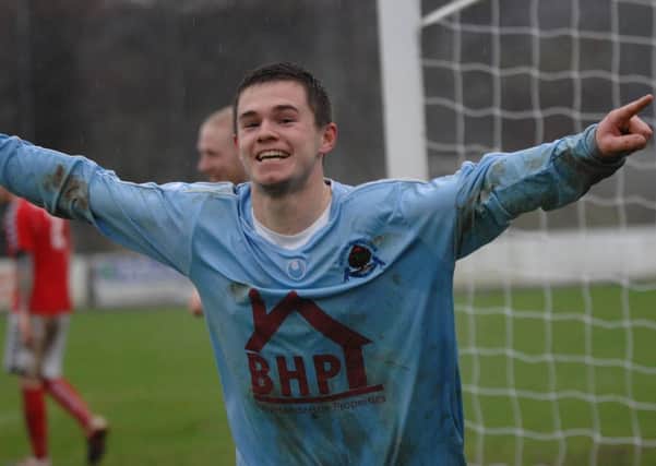 Michael McCrudden is delighted after his goal as Institute gain a 6-1 win over Larne on Saturday.