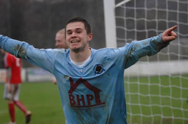 Michael McCrudden is delighted after his goal as Institute gain a 6-1 win over Larne on Saturday.