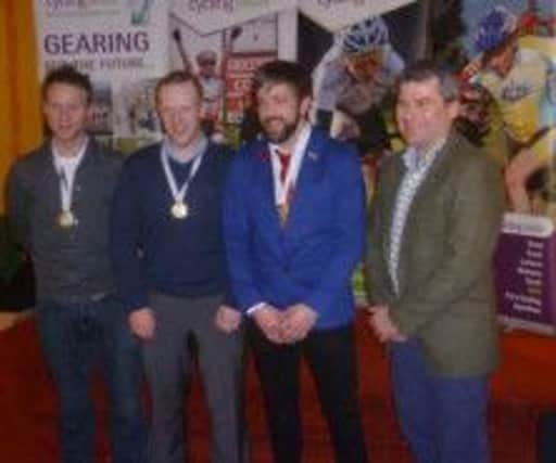 100 mile Gold Medal Team winners at the cycling event. Included are Stevie McAllister, Mervyn Linton and Bryan McKinney.