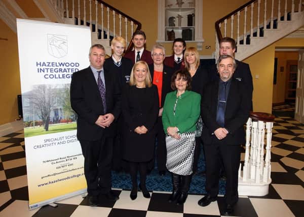 Representatives from several major teaching unions visited Hazelwood Integrated College to learn about integrated education. Pictured are, front row (l-r), Stephen McCord (president of Ulster Teachers Union), Hazelwood principal Kathleen Gormley, Beth Davies (president of National Union of Teachers) and Phil Jackson (President of the Educational Institute of Scotland). Middle row: Natasha Norcross, Rita Fox (Irish National Teachers Organisation), Jacquie Reid from the UTU and Brandon Graham. Back row: Dean McKay and Amy Garner. INNT 04-004-FP