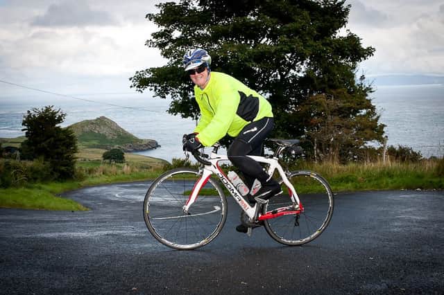 A cyclist on the Torr Head Road.