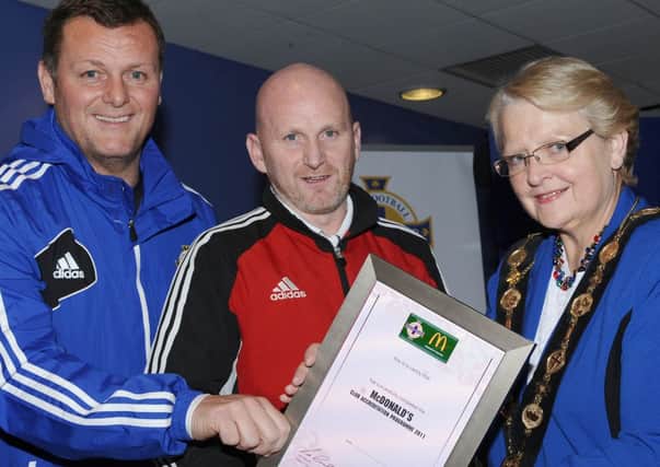 Pictured with the Hillsborough Boys Football Club Accreditation certificate are Jim Magilton, IFA Elite Performance Director; Alistair McComb, Hillsborough Boys Football Club and the Mayor of Lisburn, Councillor Margaret Tolerton.