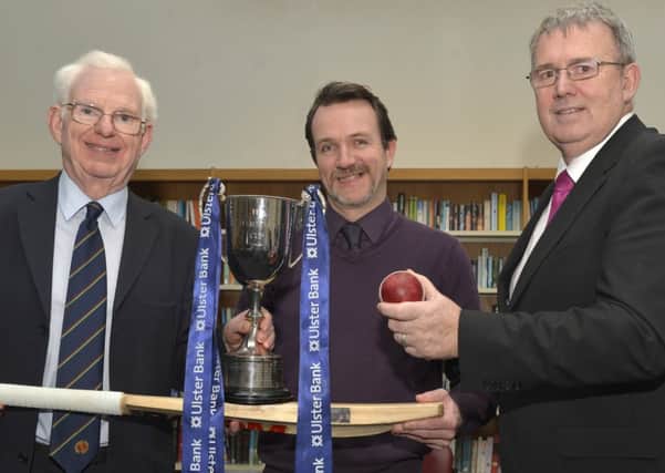 David Keown of Foyle College at the draw for the Ulster Bank Schools Cricket Club with Dr Murray Power, Chairman of the Schools Committee (left) and Stephen Cruise of Ulster Bank.