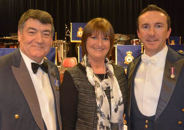 Wg Cdr Noel Williams, Mrs Jackie Stewart (Principal Downshire School) and Flt Lt Richard Murray.  INCT 04-736-CON