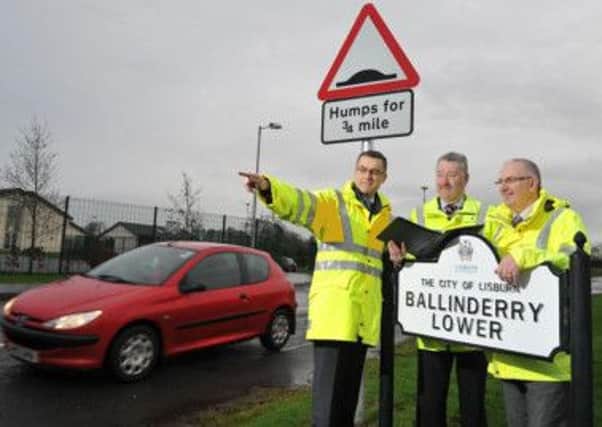 Picture: Michael Cooper
Regional Development Minister Danny Kennedy (R) with Roads Service Engineer Eamonn McMahon (centre) and Roads Service Traffic Manager Paul King (L) in Ballinderry Lower following the completion of a £100,000 resurfacing and traffic calming scheme. Sections of the Aghalee Road were resurfaced in conjunction with the installation of road humps on Aghalee Road, Crumlin Road and Lower Ballinderry Road.