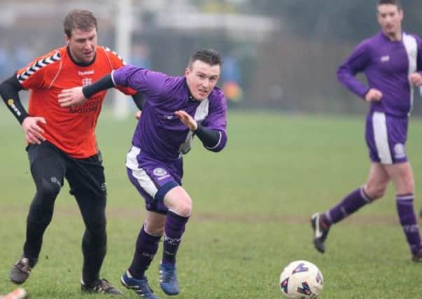 Action from the game between First Lisburn and Bloomfield, at Barbour Playing Fields. US1404-521cd