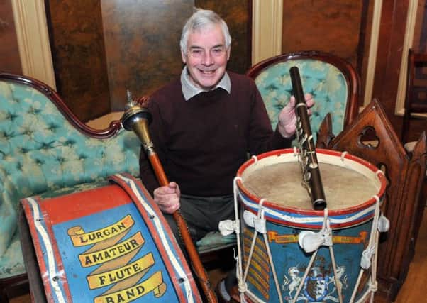 Sam McCleary with the mace, a flute and drums from Lurgan Amateur Flute Band.