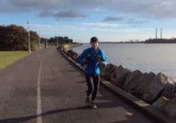 Seapark's Gary Connolly sprinting to the finish line at Clontarf Marathon. INLT 05-908-CON
