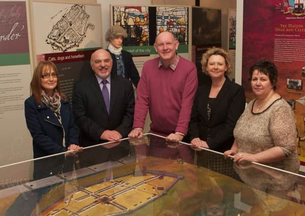 Angela Hughes, Ilex, Sammy Gamble, Department of Employment and Learning , Billy Moore, The Apprentice Boys of Derry, Carolyn Boyd, NITB and Ana McColgan, WorldHost, pictured at the Apprentice Boys of Derry Memorial Hall as they become the 300th business in the city to receive WorldHost recognition.
