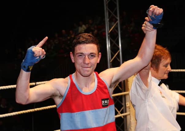 Anthony O'Rawe celebrates his Ulster bantamweight title victory in 2013. Picture: Press Eye.