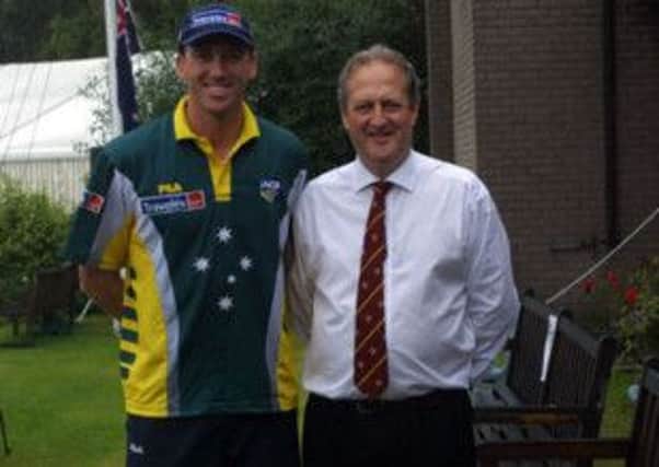 Eric Cooke pictured with former Australian pace bowler Glenn McGrath.