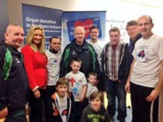 Stever Carter (right) with his sons Cameron and Ethan, Neil Robinson, Christopher Johnston, Jo-Anne Dobson MLA and representatives of Transplant Sport NI and LA Fitness at the first of the nine challenges. INNT 05-507CON