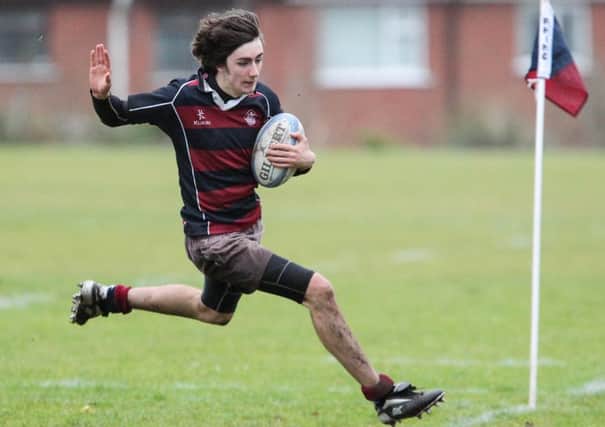 Christian Robinson scored two tries in Carrick Grammar's win over Friends.