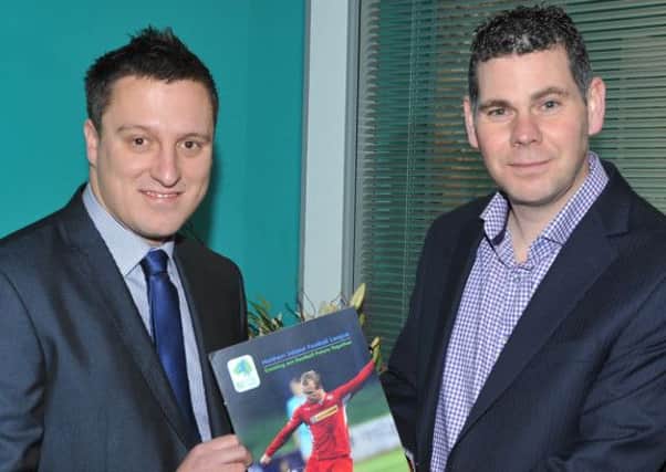 Andrew Johnston, NI Football League Managing Director, alongside Glenn Hall, Millward Brown Research Director.