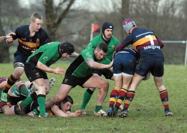 Stephen Ferguson and Ryan Campbell try to halt a Banbridge attack during Saturdays AIL game at Banbridge Academy.