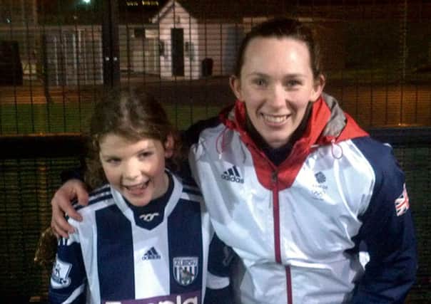 Northern Ireland International Ladies goalkeeper, Emma Higgins with Carniny Youth player Rachel Dennison at their training last week.