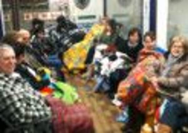 Garth Brooks fans camping out in High Street Arcade outside Skelton Travel.