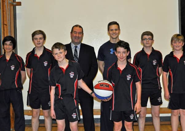Mr Keith Savage of Antrim Credit Union, who has provided sponsorship for basketball coaching at Ballymena. He is pictured with Ryan Hayes (coach) and a squad of year 10 pupils: Back row (l-r): Matthew Desphande, Reuben Harrison, Dan Brown, Ciaran McKeown. Front row: (l-r): Lewis Adger, Jack Dawson.