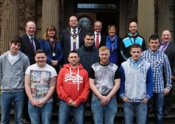 SRC Chief Executive Brian Doran is joined by SPICE Co-ordinator Barry
Fegan, Mayor of Craigavon, Councillor Mark Baxter and representatives
from DEL and SRC to celebrate with recent graduates of the SPICE
programme.