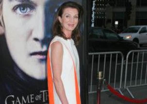 03/18/2013 - Michelle Fairley - HBO's "Game of Thrones" Third Season Premiere - Arrivals - TCL Chinese Theatre - Hollywood, CA, USA - Keywords: "Game of Thrones" Season 3 Premiere red carpet Orientation: Portrait Face Count: 1 - False - Photo Credit: Izumi Hasegawa / PR Photos - Contact (1-866-551-7827) - Portrait Face Count: 1