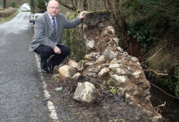 The Mayor, Councillor John Finlay, who is calling for safety measures at a bridge near Drumaheglis Orange Hall.INBM06-14 LMM