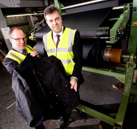 Francis Dinsmore Ltd has secured a contract with global heritage and lifestyle brand Barbour, following an investment in a new production facility supported by Invest Northern Ireland. Pictured (L-R) during a visit to the company is Barry Corrigan, Managing Director of Dinsmores, with Invest NI Chief Executive Alastair Hamilton.Pic by Parkway Photography.
