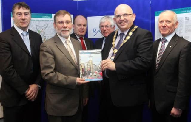 Social Development Minister Nelson McCausland pictured during a visit to Ballymoney to launch a Masterplan for the town. Pictured with the Minister are members of Ballymoney Chamber of Commerce and Ballymoney Regeneration Company. The Masterplan sets out a range of proposals for redeveloping the town centre over a period of up to 20 years.  Some of the highlighted regeneration opportunities included in the plan are proposals for the better use of public space, the development of a new Transport Interchange and the review of linkages throughout the town.