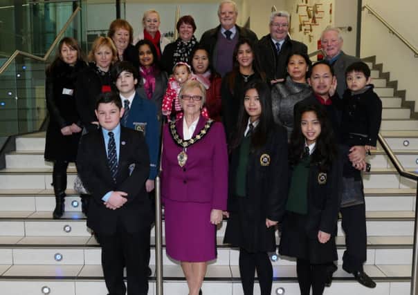 Locals who raised £6,071 for the Philippines Disaster Fund were guests at a Mayor's reception in the Braid Arts Centre hosted by Mayor of Ballymena Cllr Audrey Wales. Included are members of the Ballymena Inter Ethnic Forum who organised the event. INBT 06-100JC