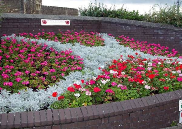 Carrick has been successful in Ulster in Bloom in recent years.  INCT 35-451-RM