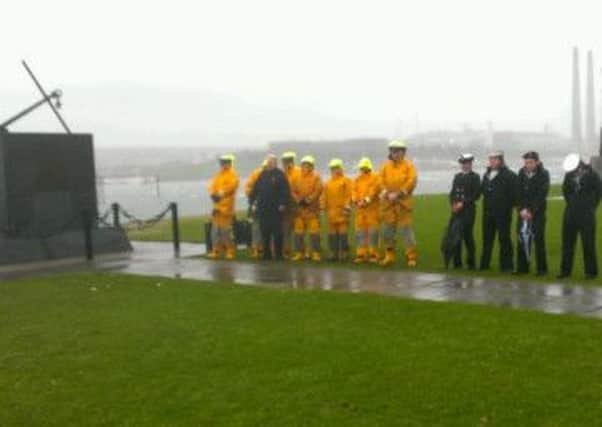 Members of Larne RNLI and Sea Cadets at the Princess Victoria memorial service.  INLT 06-680-CON