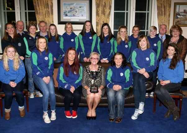Members of Ballymena 1st XI hockey team pictured at a reception with the Mayor of Ballymena, Cllr. Audrey Wales, marking the team winning the Ulster Senior Cup, the first major trophy in the club history. Included are coaches, officials and Cllr. Martin Clarke. INBT05-206AC