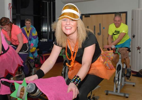 Elaine Bingham busy raising money for the NI Childrens Hospice at 1980s themed spinning night in the Amphitheatre. INCT 06-005-PSB