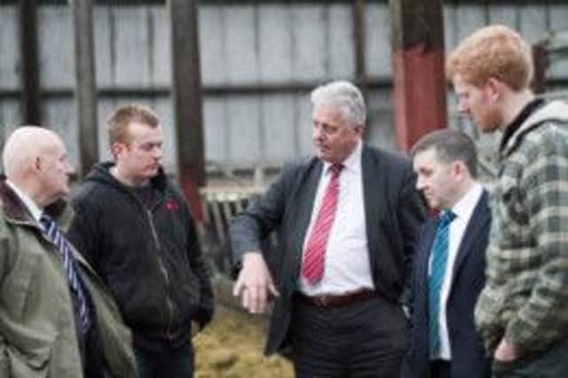 UUP MEP Jim Nicholson and North Antrim MLA Robin Swann chatting with farmers concerning the Single Farm Payment during a visit to the North Antrim.