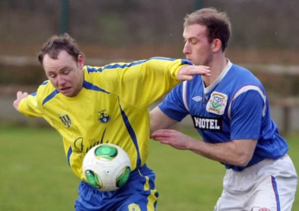 SHOVE OFF. Action from Glebe's 1-0 win over Killymoon on Saturday.INBM6-14 042SC.