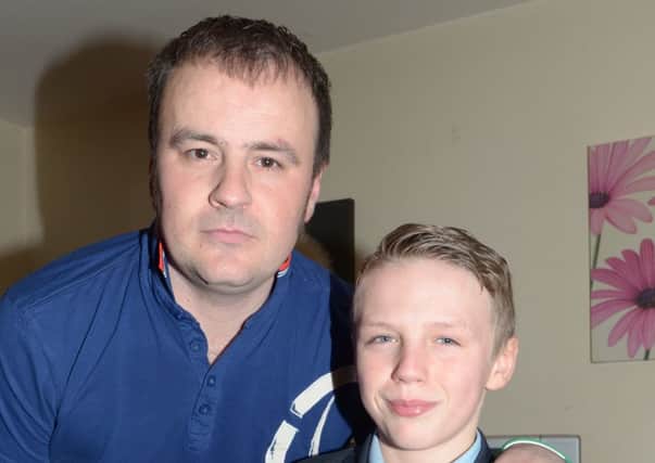 Cameron Clarke and his dad Michael. INCT 06-366-PR