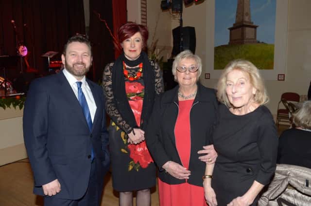 Pictured at the  at the Holocaust Memorial event in Carrickfergus Town Hall are broadcaster William Crawley, Town Clerk Sheila McClelland, Cllr Beryl McKnight and Inge Radford. INCT 06-326-PR