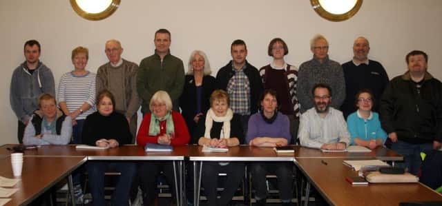 Members of Ballymoney Creative Writers' Group pictured at a special class in the Town Hall last Tuesday night when Professor Paula Meehan to conduct a workshop.INBM07-14 120F