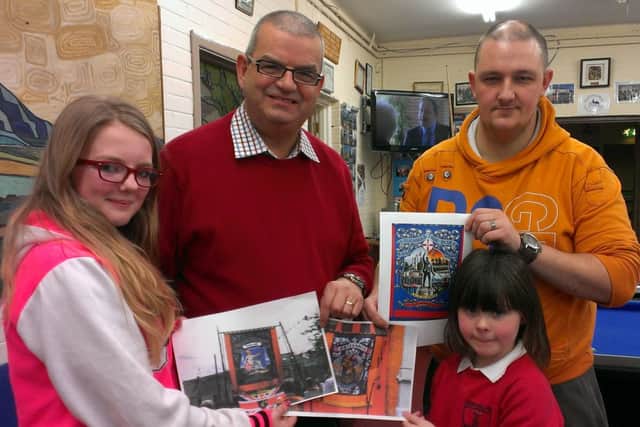 Victor Wray, of Britannia LOL1912, second left, and artist Mark Logan, right, with young artists Megan Walker and Caitlyn Warke.