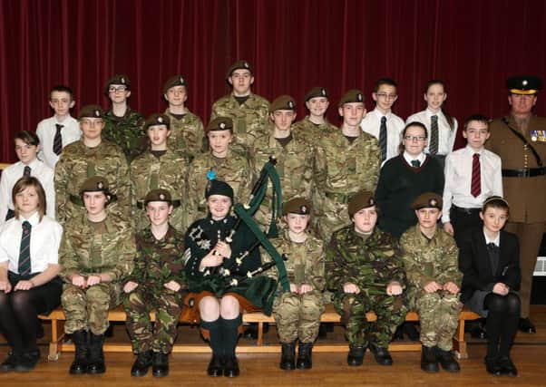 Members of the Irish Guards Cadets, Cullybackey detachment, at their annual inspection evening in Cullybackey High School. Included is Inspection Officer Major Mateer. INBT 06-109JC