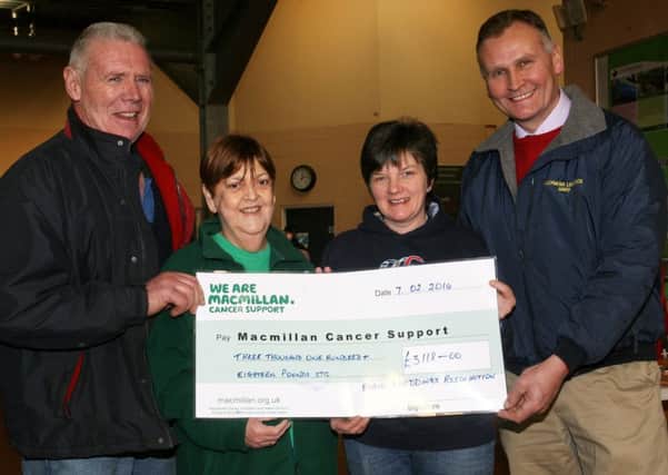 Margaret Jamieson of Macmillan Cancer Support receives a cheque for £3118 from Sam Wallace and May Adams (Treasurer) of Braid Shedding Sheep Association and Sam McNabney (Ballymena Livestock Market), proceeds of the recent Braid Shedding charity sheep stock judging event. INBT07-223AC