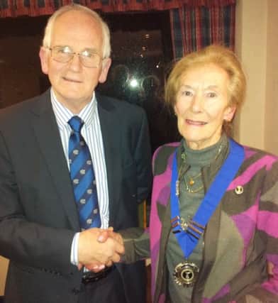 Ed McKnight, Royal British Legion, congratulates Claire Pauley, Carrickfergus RAFA branch president, on her election at the RAFA annual general meeting. INCT 07-706-CON