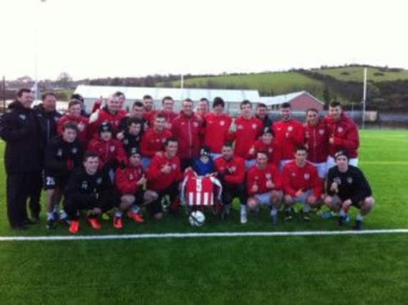 Oliver is pictured with the Derry City squad.