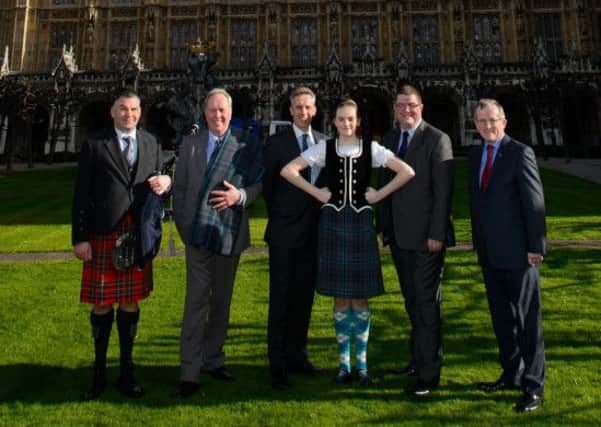 (L-R) Piper Alan McCormick, Martin Balmer Giants Causeway Tartan, Ian Paisley MP, Dancer Alison Davis, Ian Crozier Ulster Scots Agency and Niall Gibbons Tourism Ireland attend the launch of the Giants Causeway Tartan special event at the Ulster Scots Reception in Westminister Hall.