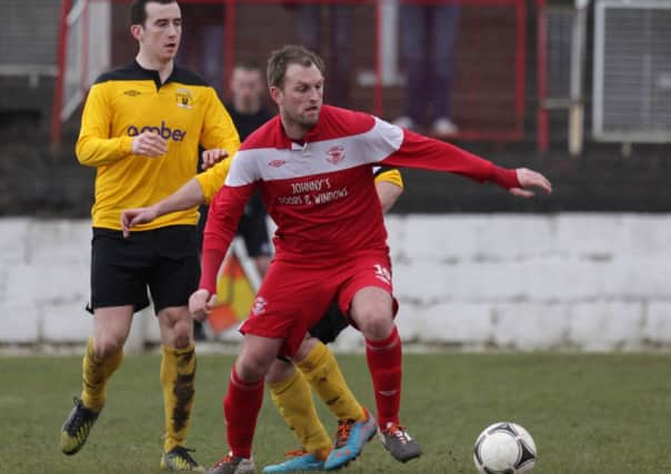 Larne's William Wharry in action against the Welders. Photo: Presseye.