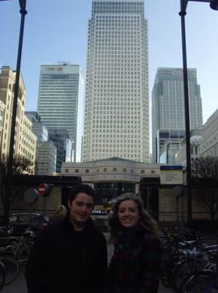 Matthew Garrett and Megan McIlroy in the centre of Canary Wharf. INCT 07-799-CON